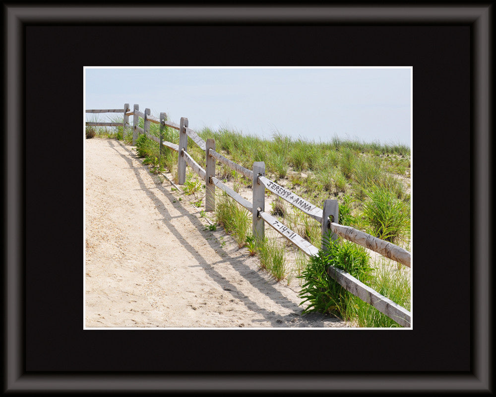 carved beach fence art